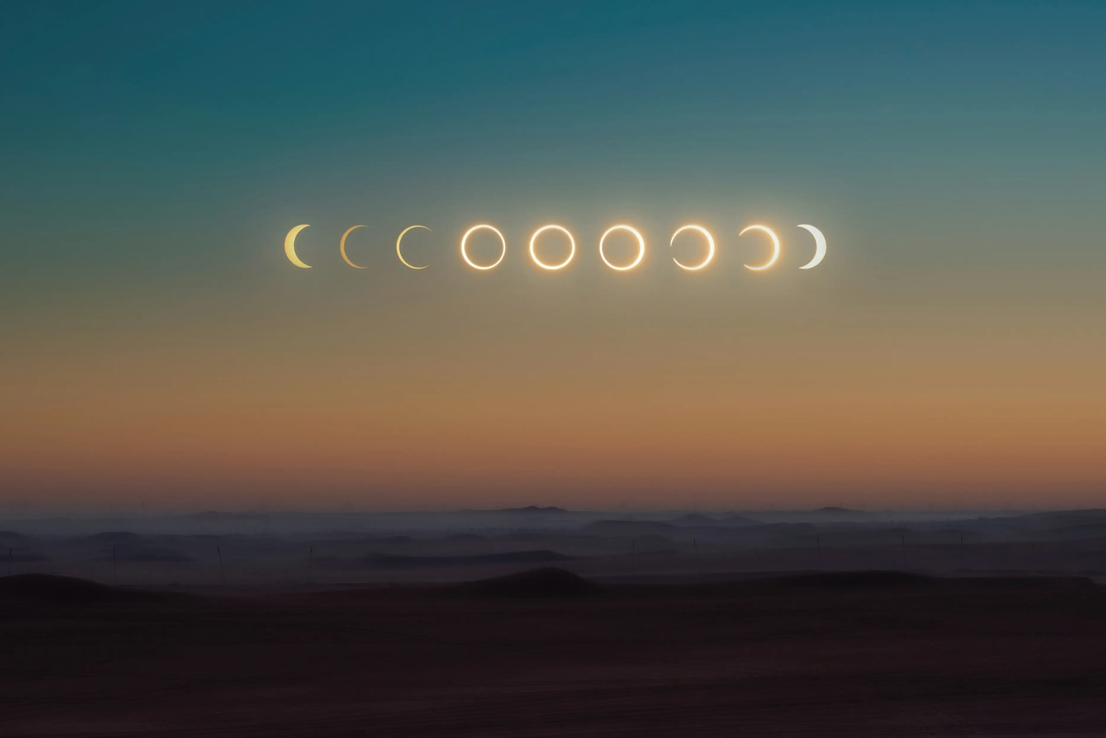 A time lapse image of a solar eclipse with each phase of the changing sun and moon shadow.