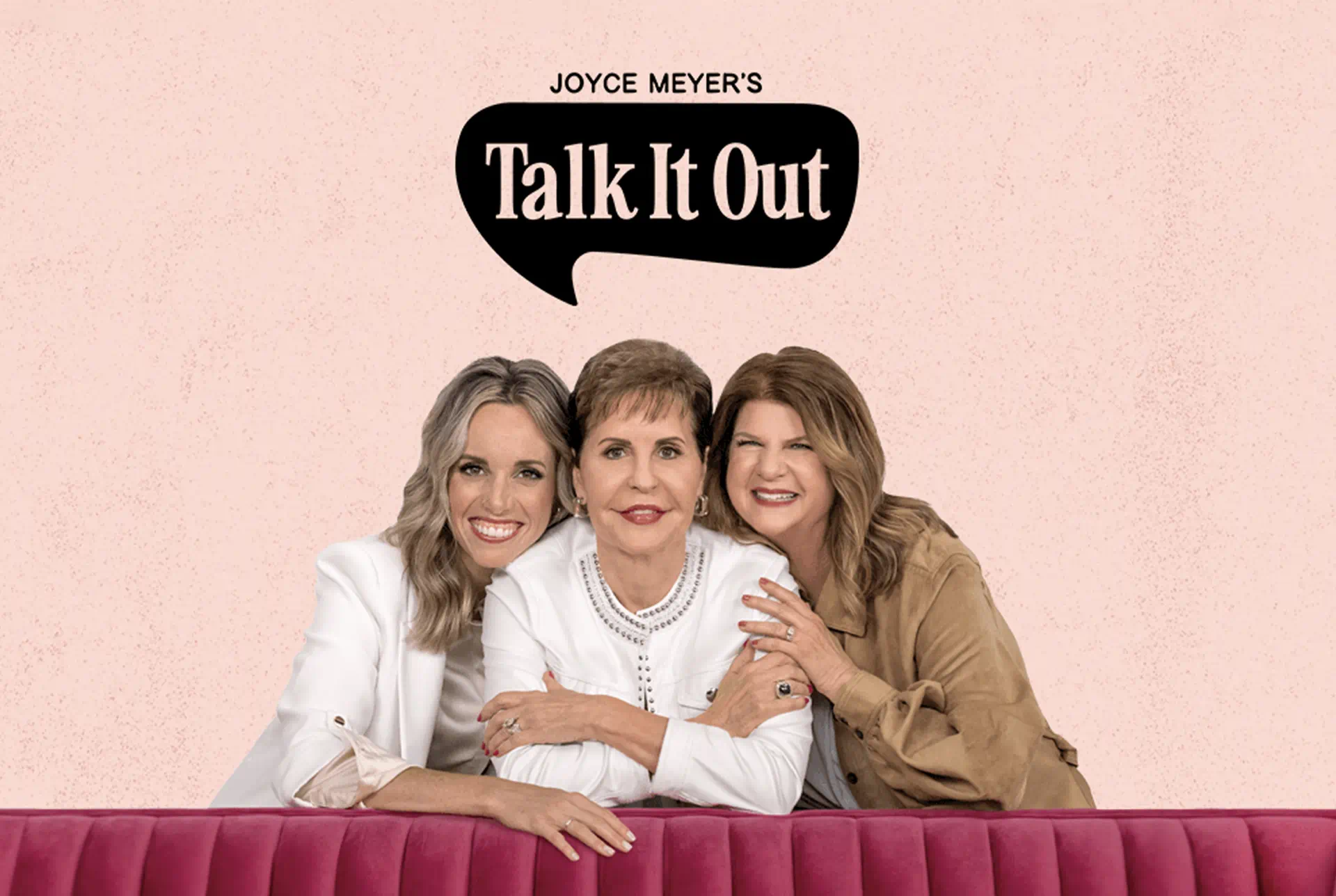 Erin Cluely, Ginger Stache, ���˳Թ��� smiling behind the pink Talk It Out couch.